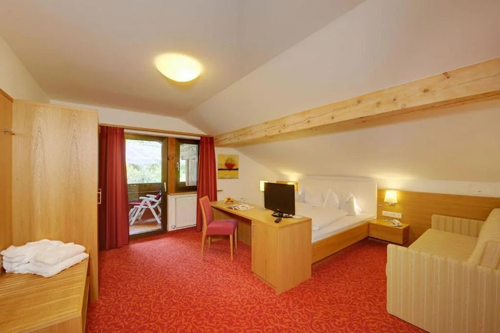 Double Room with Balcony (2 Adults + 1 Child) — Hotel Laurin