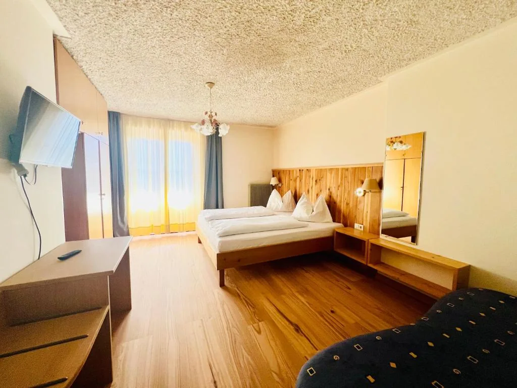 Double Room with Balcony (2 Adults + 1 Child) — LAKE & RIVER Hotel
