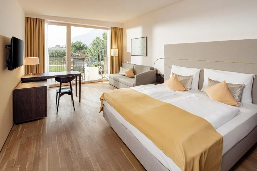 Double Room with Balcony and Garden View — Hotel Thalhof am See