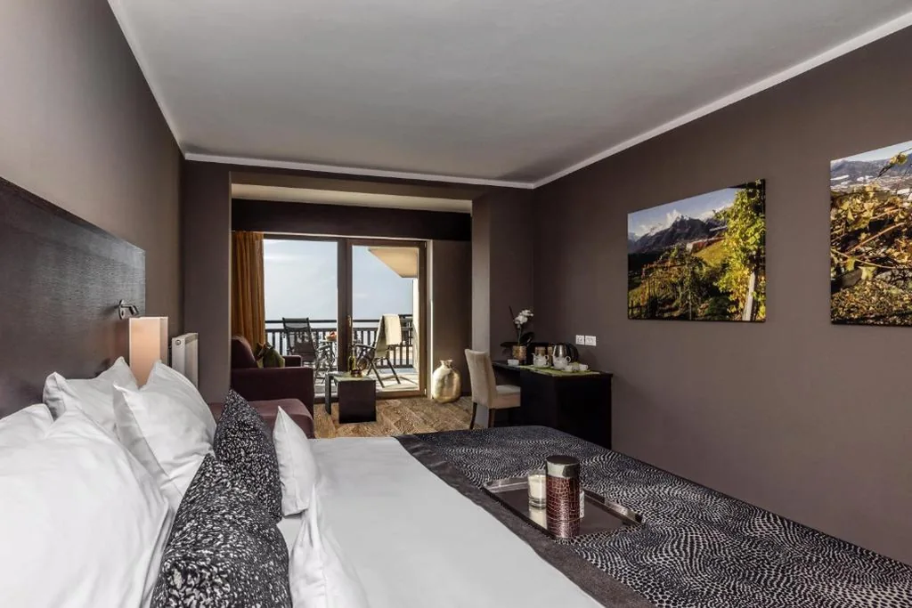 Camera Matrimoniale Deluxe con Balcone — SOLEA SÜDTIROL Boutique Hotel