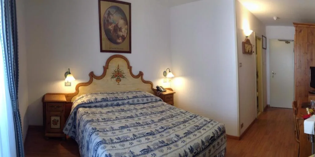 Camera Matrimoniale/Doppia con Letti Singoli con Letto Supplementare — Park Hotel Mater Dei