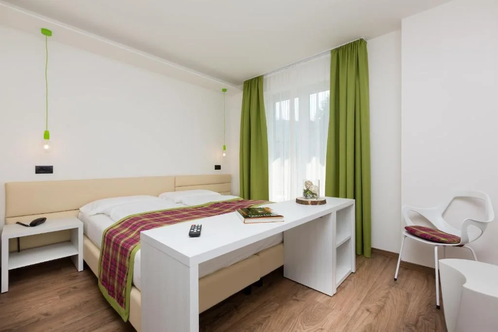 Double/Twin Room with Garden View — Brione Green Resort