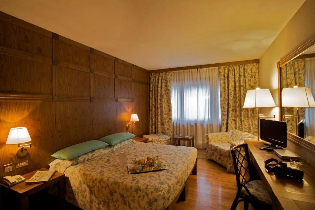 Camera Matrimoniale — Savoia Palace Hotel