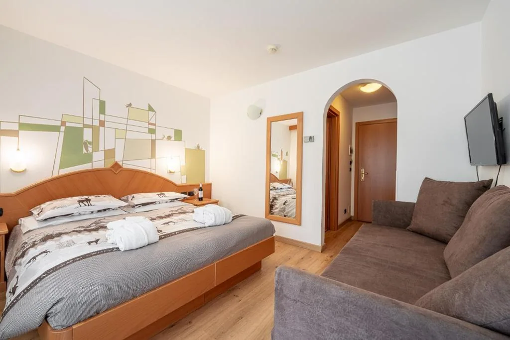 Camera Quadrupla Classic — Hotel Dolomites Inn