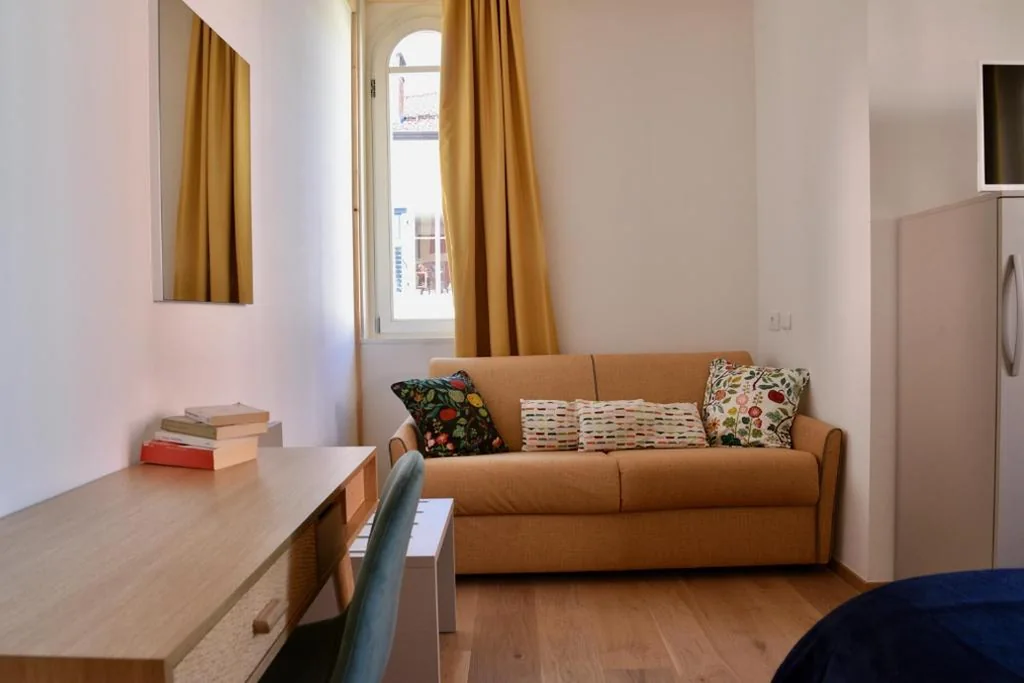 Camera Quadrupla con Bagno in Comune — Nine Rooms Shared