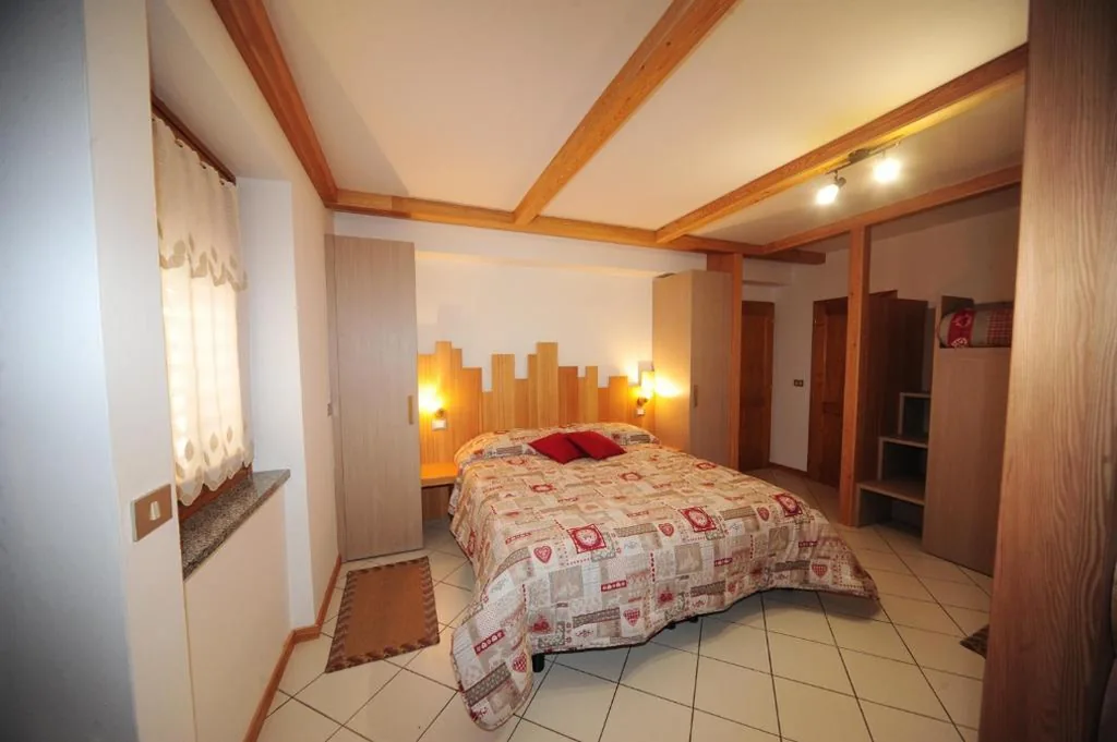 Quadruple Room with Private Bathroom — Appartamenti e Camere Veronica