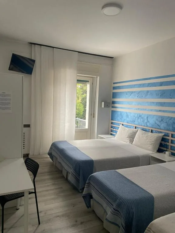 Quadruple Room with Private Bathroom — B&B Homer Trento