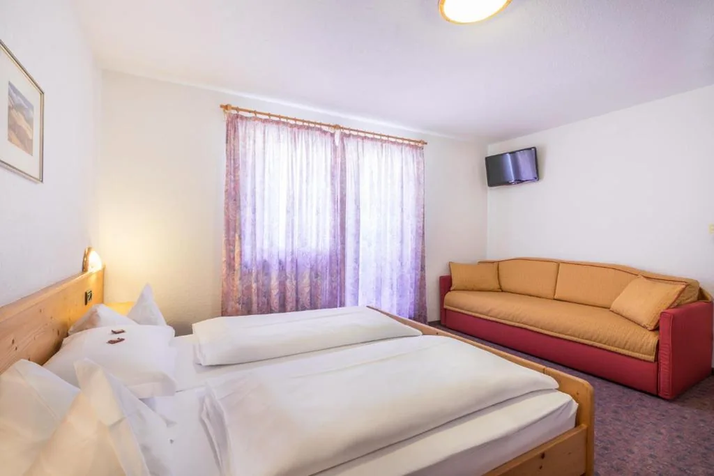 Quadruple Room with Balcony — Berghotel Schlemmer