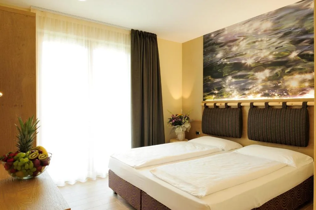 Quadruple Room with Balcony or Patio — Eco Hotel Bonapace