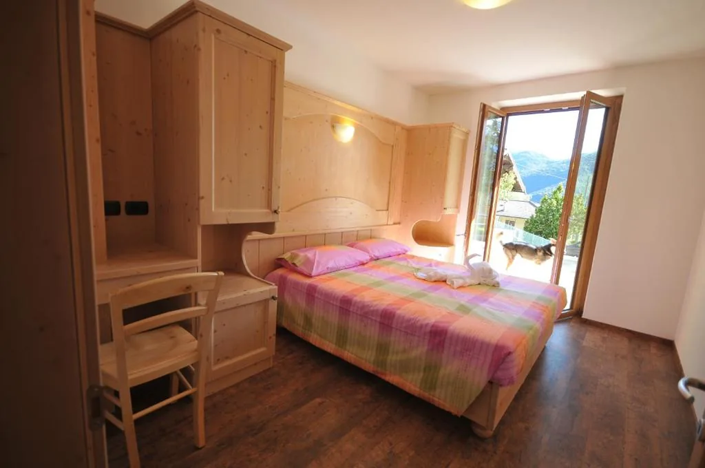 Camera Quadrupla con Vista Giardino — B&B Ledro AFFITTACAMERE