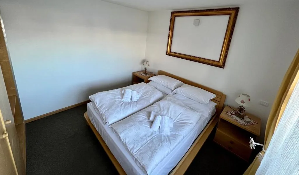 Camera Quadrupla con Vista Montagna — B&B CHALET NICOLUSSI
