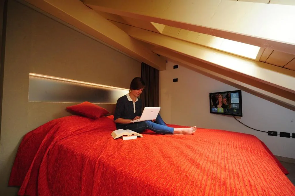 Deluxe Quadruple Room — Appartamenti e Camere Veronica