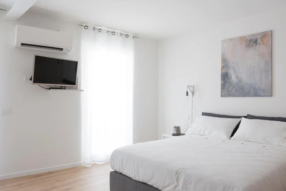 Deluxe Quadruple Room — Arco Dei Sogni