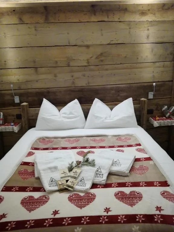 Deluxe Quadruple Room — Atmosphere di montagna