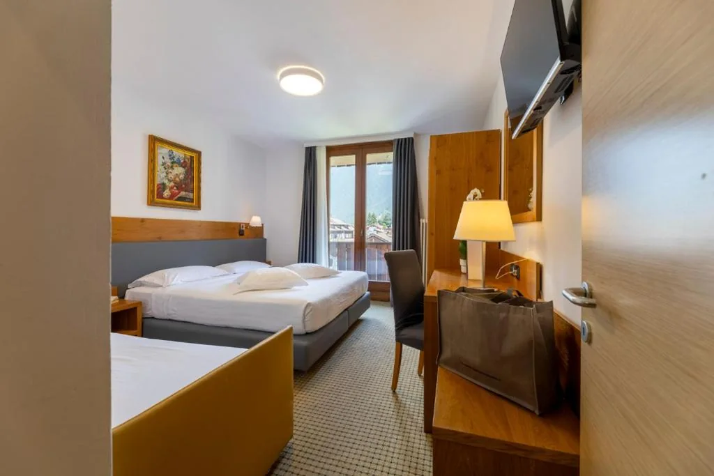 Camera Quadrupla Deluxe — Royal Olympic Hotel