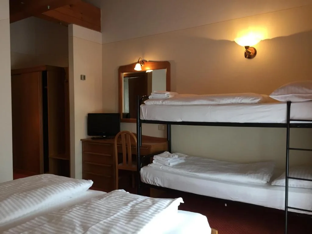Camera Quadrupla Economy — Hotel Collini