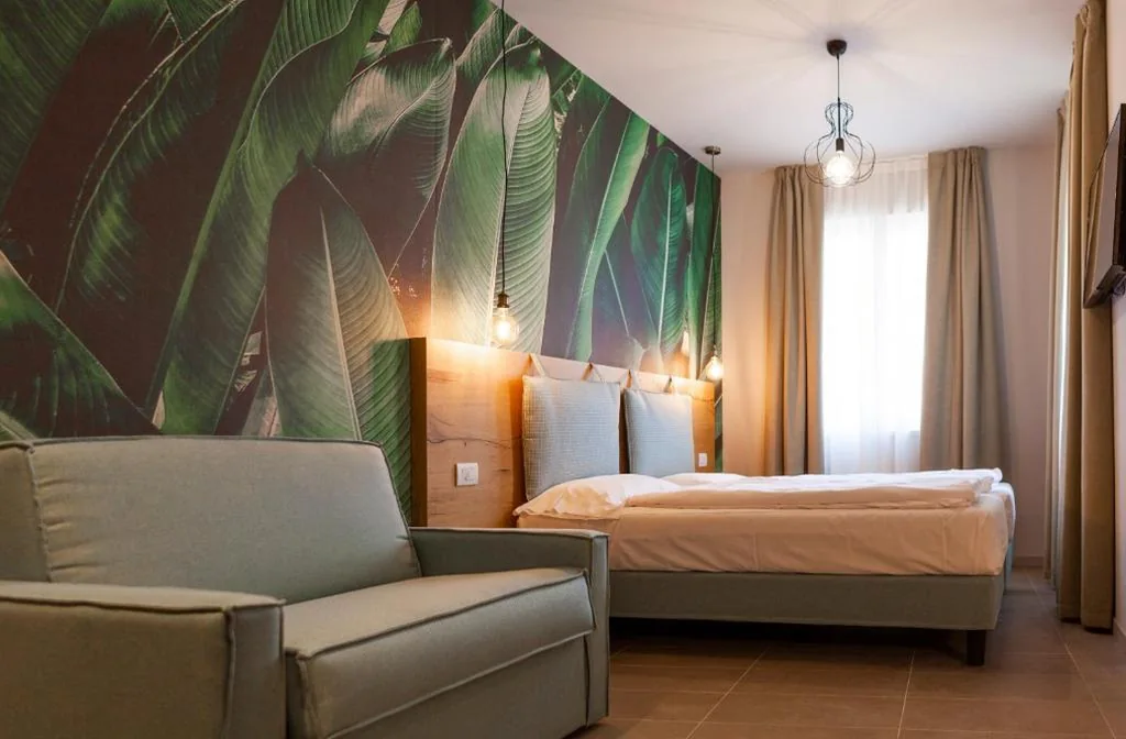 Camera Quadrupla — epOche Hotel Zanella 1889
