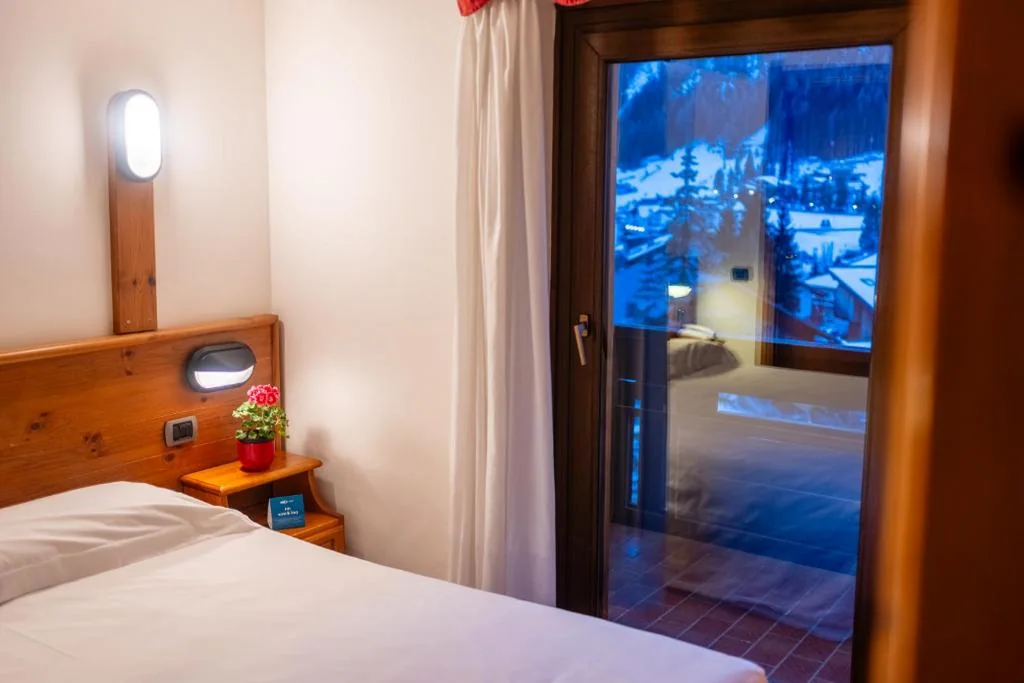 Camera Quadrupla Familiare Comfort — Hotel Miramonti Corvara