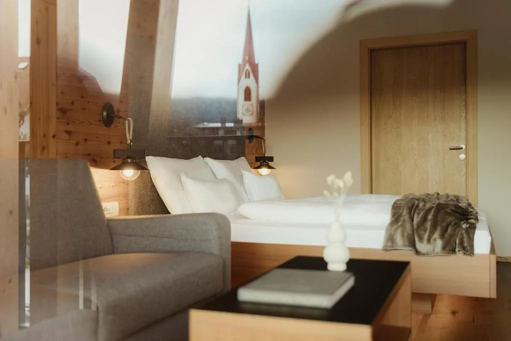 Quadruple Room — Hotel B&B Feldmessner