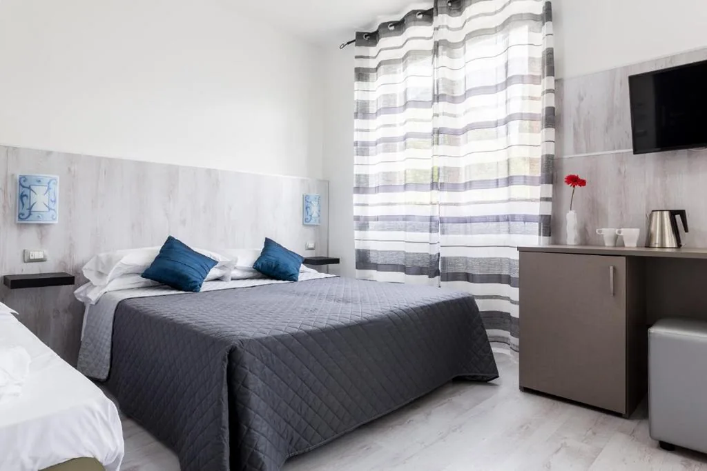 Camera Quadrupla — Hotel Canarino