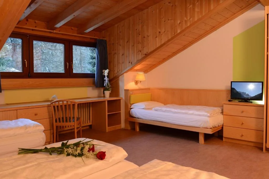 Camera Quadrupla — Hotel Casa Alpina – Alpin Haus