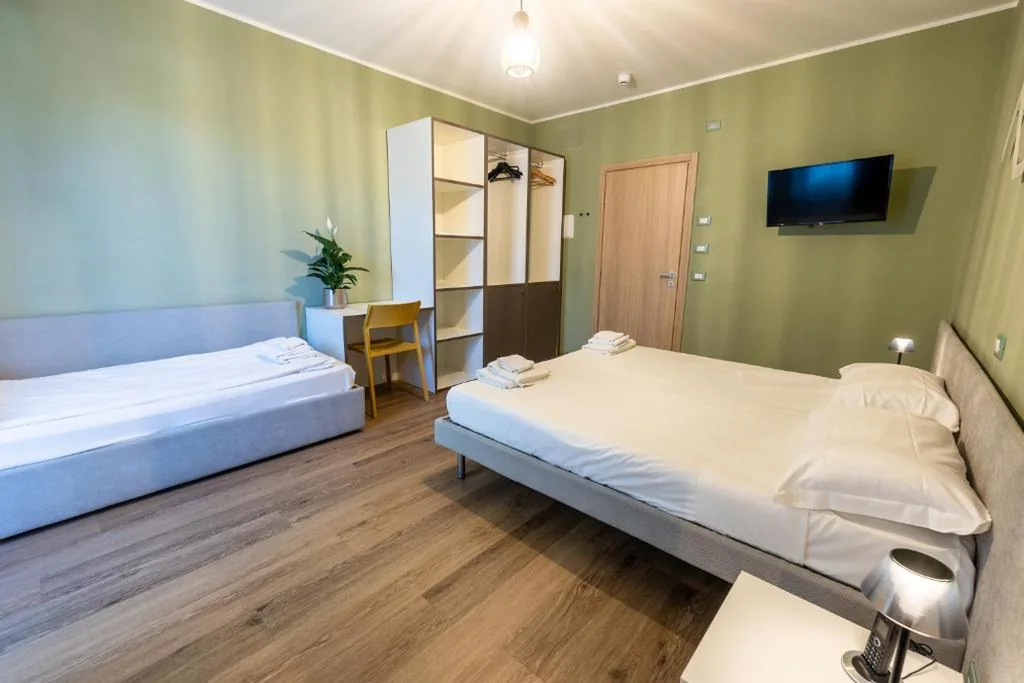 Camera Quadrupla — Hotel Casa Alpina