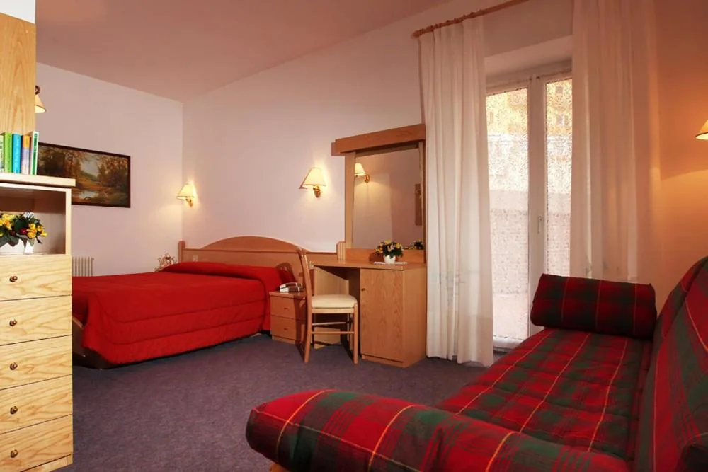 Camera Quadrupla — Hotel Garnì Villanova