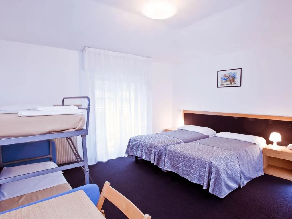 Quadruple Room — Hotel Rubino