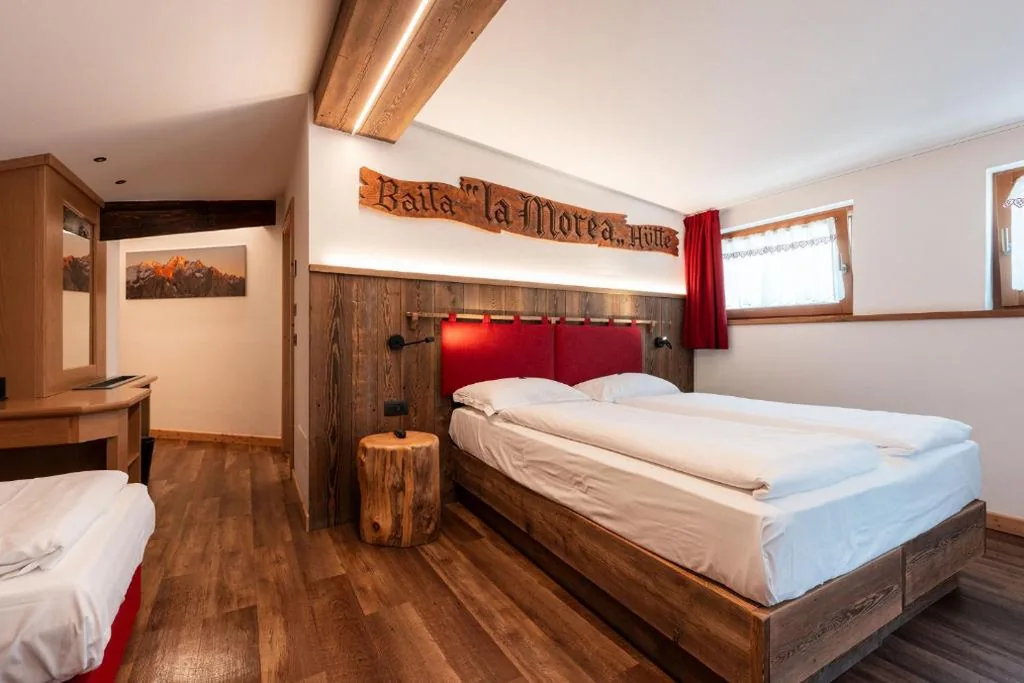 Camera Quadrupla Standard — Hotel Piedibosco