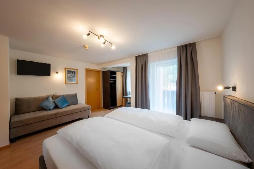 Superior Quadruple Room — Hotel Monte44