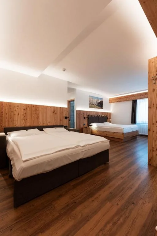 Camera Quadrupla Superior — Hotel Piedibosco