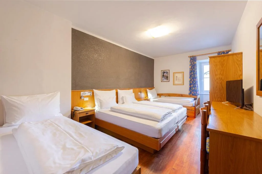 Camera Quadrupla Superior — Hotel Stella