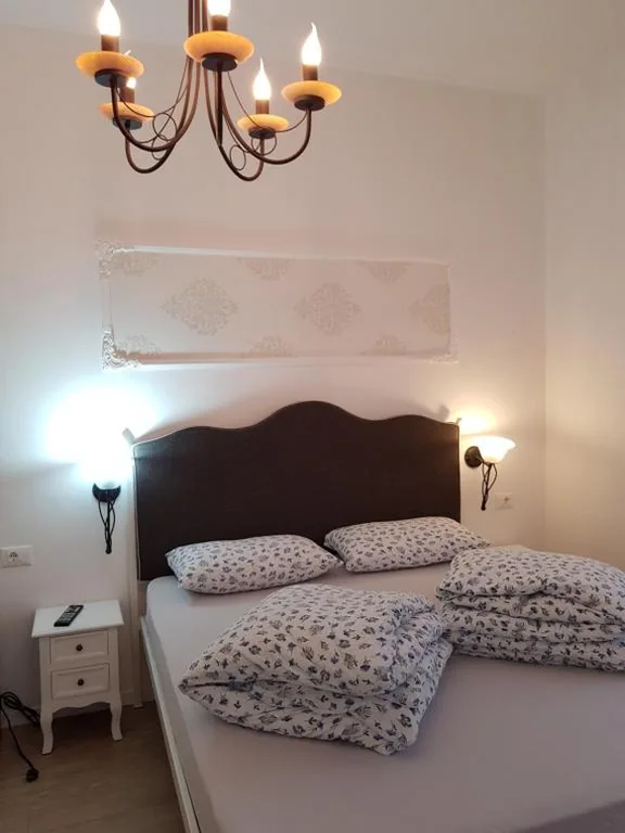 Camera Queen con Balcone — Garni Villa Tyrol – Adults Only