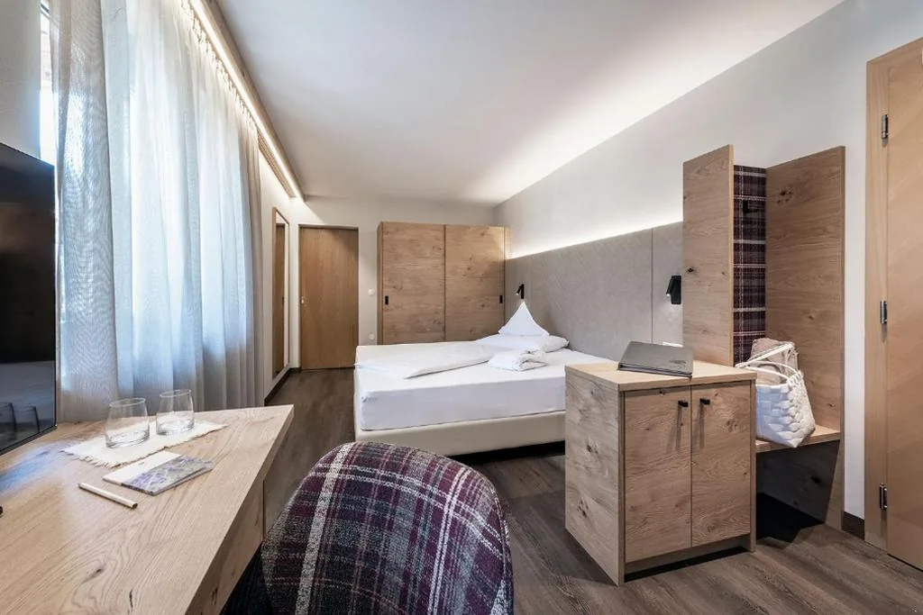 Single Room with Balcony — Baumgartner’s Blumenhotel