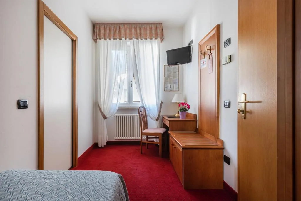 Single Room — Hotel Lucia