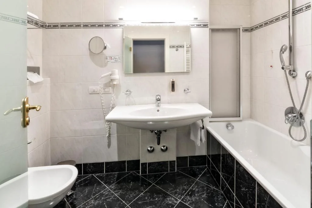 Camera Singola — HOTEL POST alpine cityflair