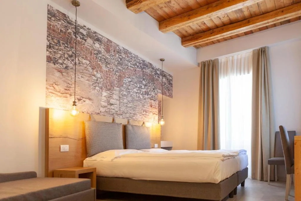 Camera Superior Matrimoniale/Doppia con Letti Singoli — epOche Hotel Zanella 1889