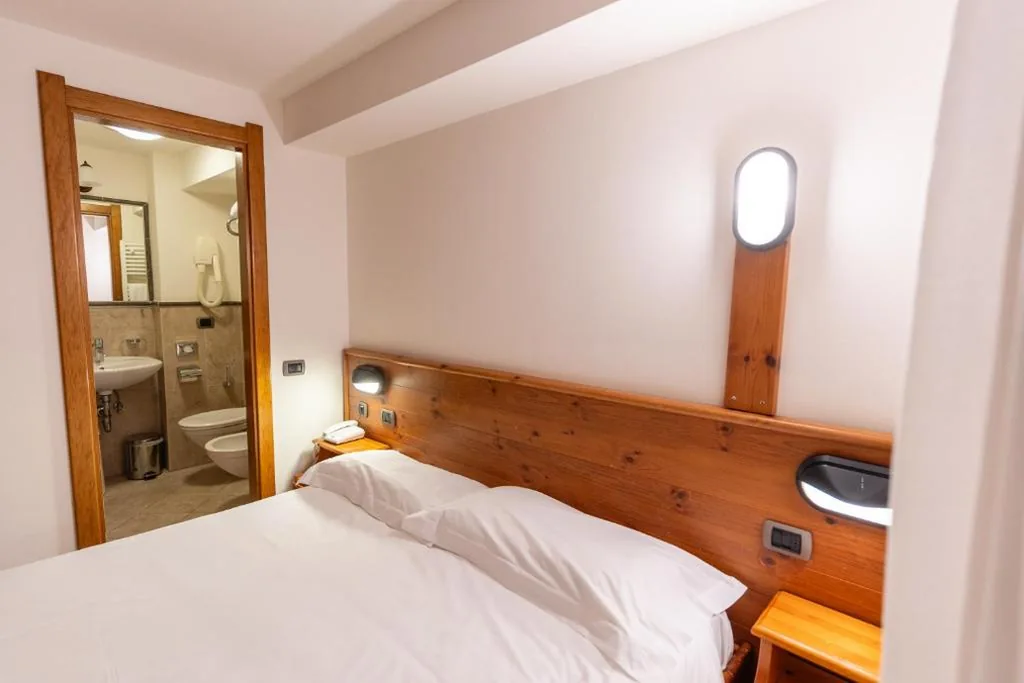 Camera Tripla Comfort — Hotel Miramonti Corvara