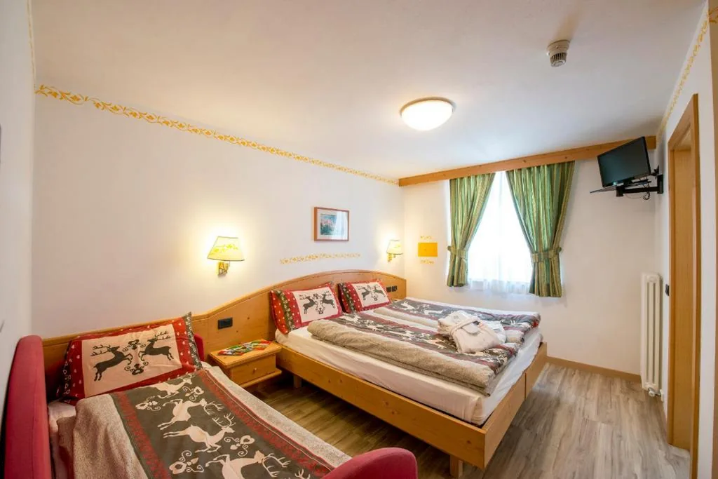 Camera Tripla Comfort — Hotel Villa Rosella Park & Wellness