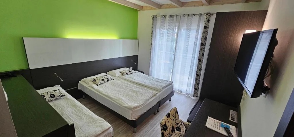 Camera Tripla con Balcone — Ecohotel Primavera