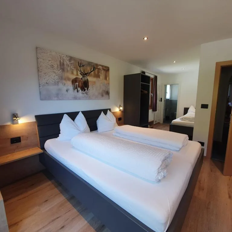 Triple Room with Balcony — Haus Herta B&B