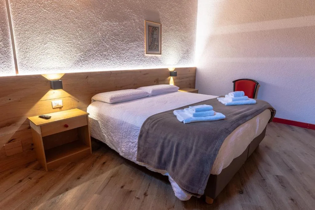 Camera Tripla con Balcone — Hotel Soran