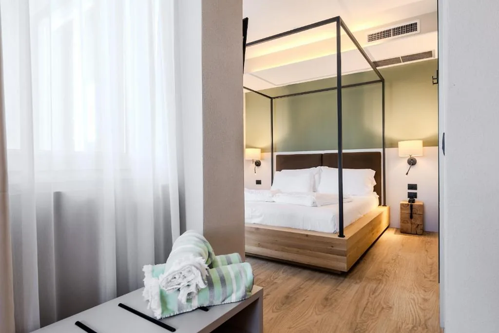 Deluxe Triple Room — Brione Green Resort