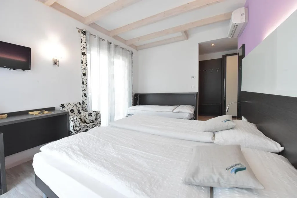 Camera Tripla Deluxe — Ecohotel Primavera