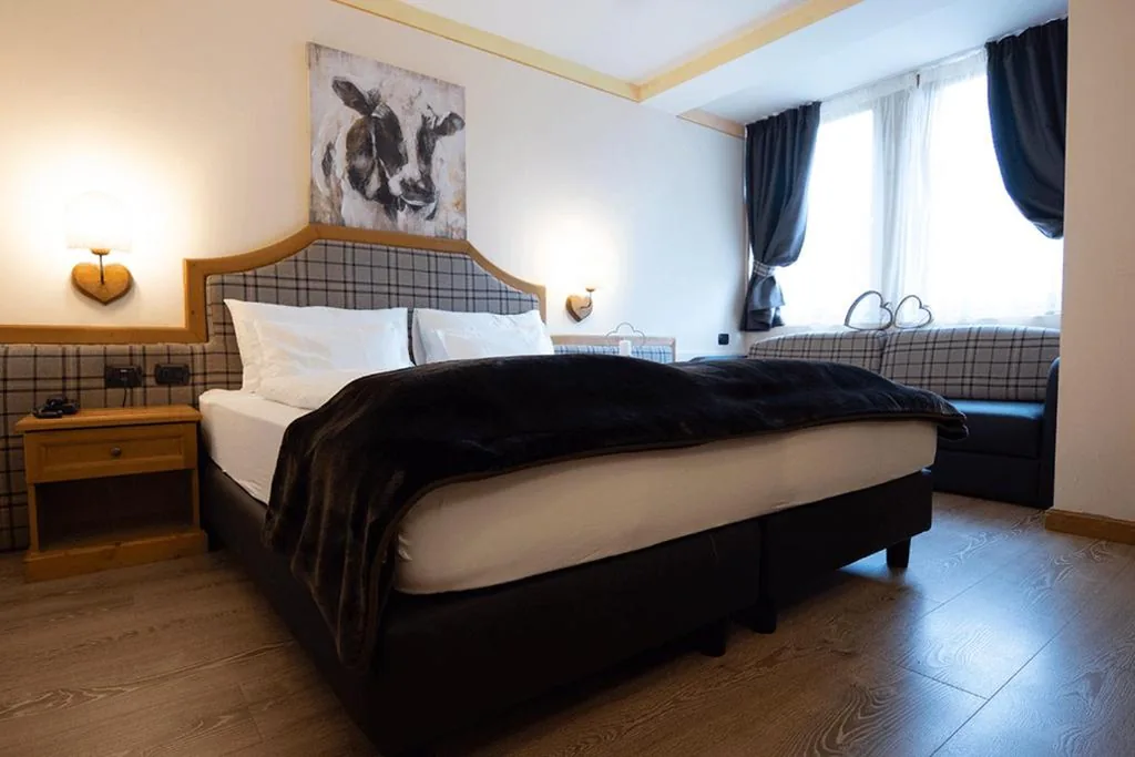 Camera Tripla Deluxe — Hotel Al Parco