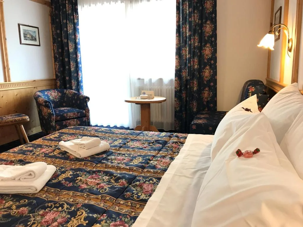 Camera Tripla Deluxe — Hotel Alpi