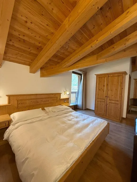 Camera Tripla Deluxe — Hotel Villa Fosine Spa & Wellness