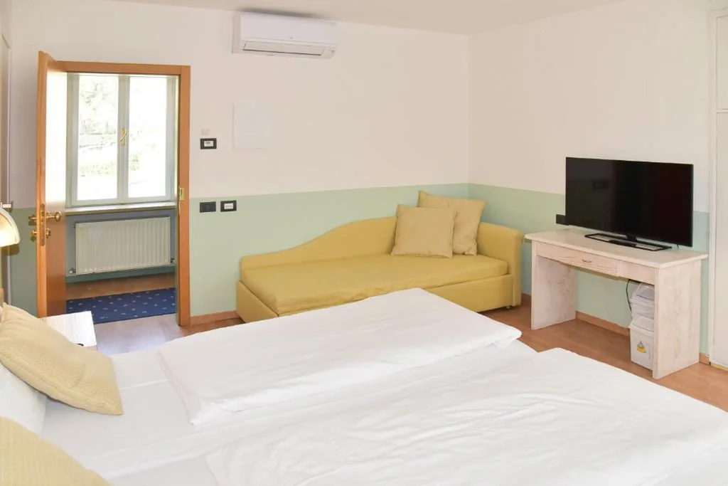 Camera Tripla — epOche Hotel Zanella 1889