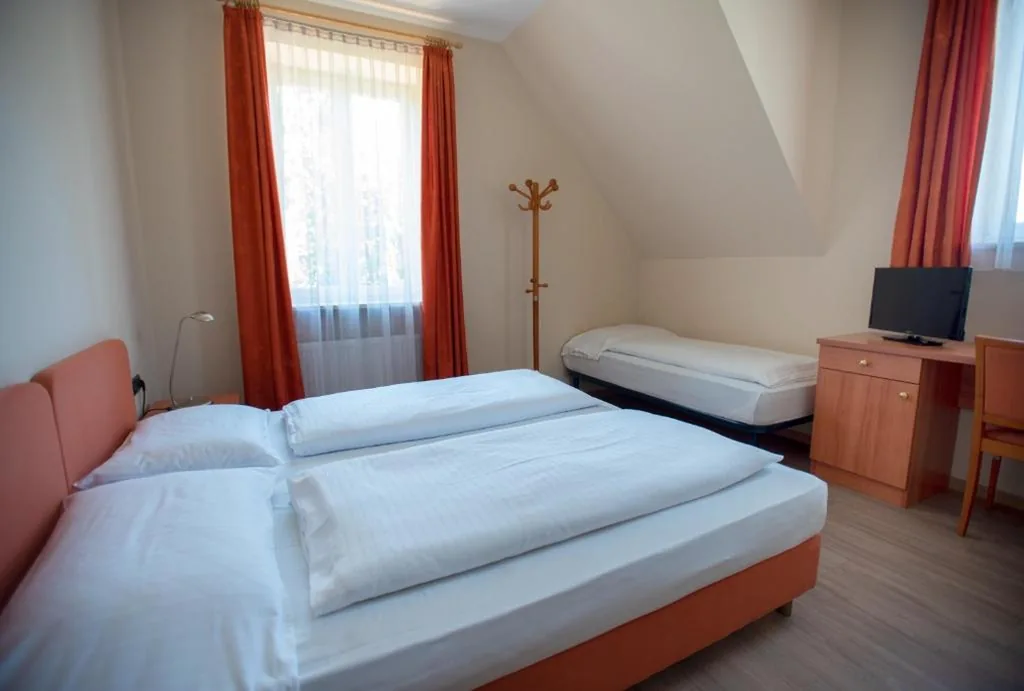 Camera Tripla — Hotel Cavallino s’Rössl