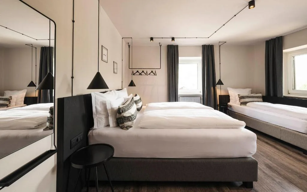 Triple Room — Hotel Löwenhof